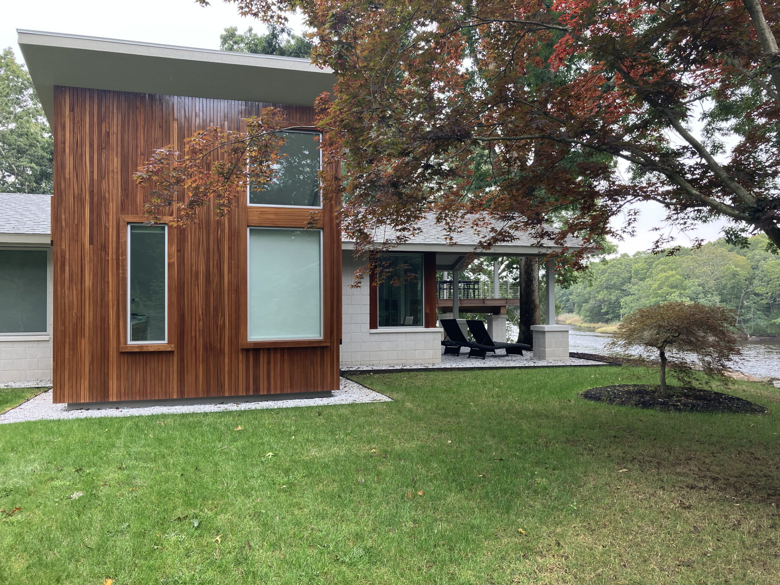 Waterfront new build featuring Marvin windows with mahogany siding in Old Saybrook, CT.